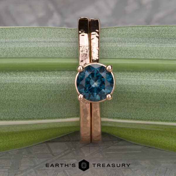 The "Mila" in 14k rose gold, hammered and polished, with 1.18-carat Montana sapphire, alongside the custom-fit straight band in 14k rose gold The "Mila" in 14k rose gold, hammered and polished, with 1.18-carat Montana sapphire, alongside the custom-fit straight band in 14k rose gold
