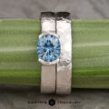 The Wide "Larisa" ring in 14k white gold with 1.42-carat Montana sapphire, alongside the custom-fit straight band in 14k white gold