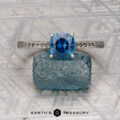 The Engraved "Cathedral" ring in platinum features a 1.29-carat Montana sapphire in a cushion cut, highlighted by intricate band detailing and an elegant engraved cathedral-style solitaire setting.