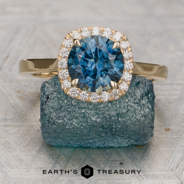 The Alice Ring featuring a 1.68-Carat Teal Blue Montana Sapphire (Heated) set in 14K Yellow Gold The Alice Ring featuring a 1.68-Carat Teal Blue Montana Sapphire (Heated) set in 14K Yellow Gold