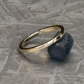 The "Astrea" Wedding Band in 14k yellow gold