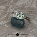 The “Toi Et Moi” Emerald-Cut ring in platinum with 1.83-Carat Montana Sapphire, customized with larger diamond