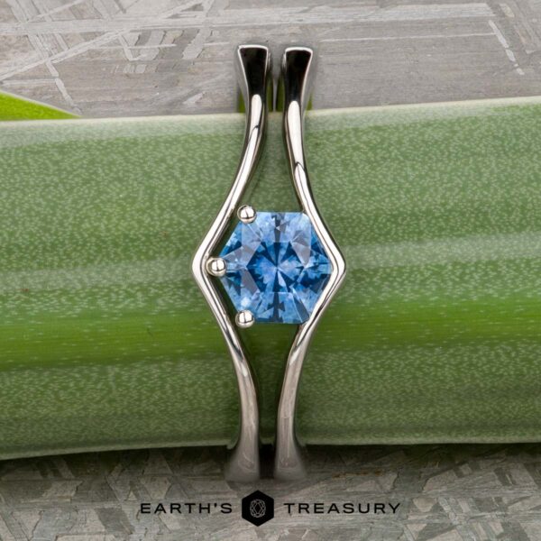 The "Ruenna" ring in platinum with 0.68-carat Montana sapphire, alongside the custom-fit chevron band in platinum The "Ruenna" ring in platinum with 0.68-carat Montana sapphire, alongside the custom-fit chevron band in platinum