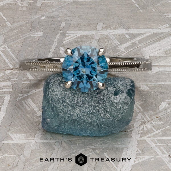 The "Milgrain Cathedral" ring in platinum with 1.66 Montana Sapphire The "Milgrain Cathedral" ring in platinum with 1.66 Montana Sapphire