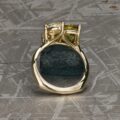 The "Moirae" Ring in 14k yellow gold and 2.2-carat Australian sapphire, customized with larger heirloom diamonds