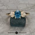The “Rayne” Cluster Ring in 14k yellow gold with 1.67-carat Montana sapphire