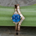 The "Melilai" ring in 14k rose gold with 1.18-carat Montana sapphire, alongside the "Mayenne" band in 14k rose gold