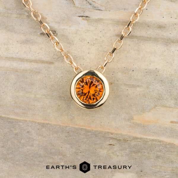 The "Shimmer" necklace, 3.5mm, in 14k yellow gold with custom orange sapphire The "Shimmer" necklace, 3.5mm, in 14k yellow gold with custom orange sapphire