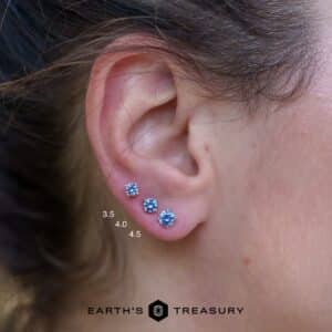 A size comparison between 3.5mm, 4.0mm, and 4.5mm size medium blue sapphire earrings