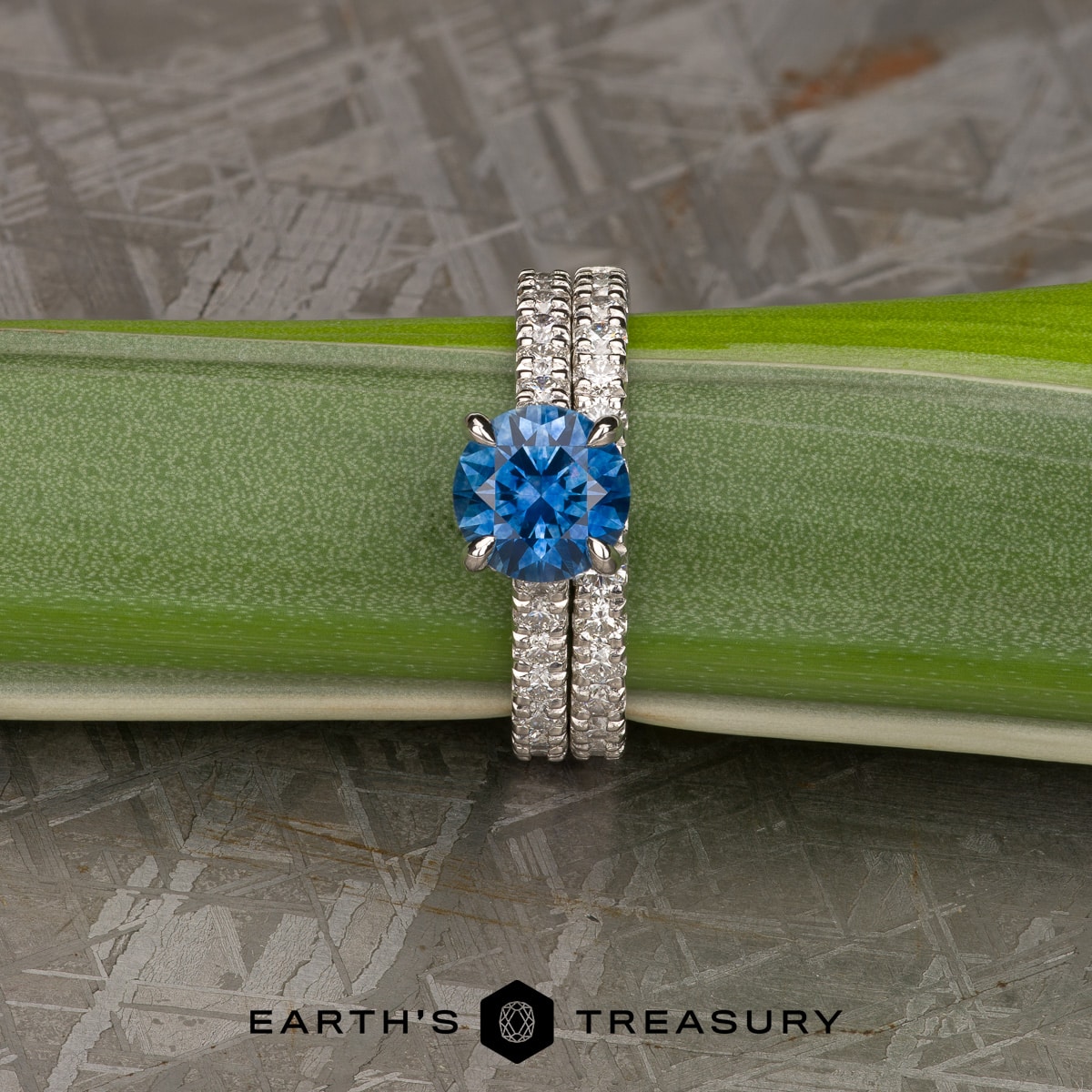 The "Marina" Deluxe Pave Ring in platinum with 1.79-Carat Montana Sapphire alongside the deluxe pave band in platinum