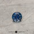 A color-change Montana sapphire in a classic diamond round brilliant design