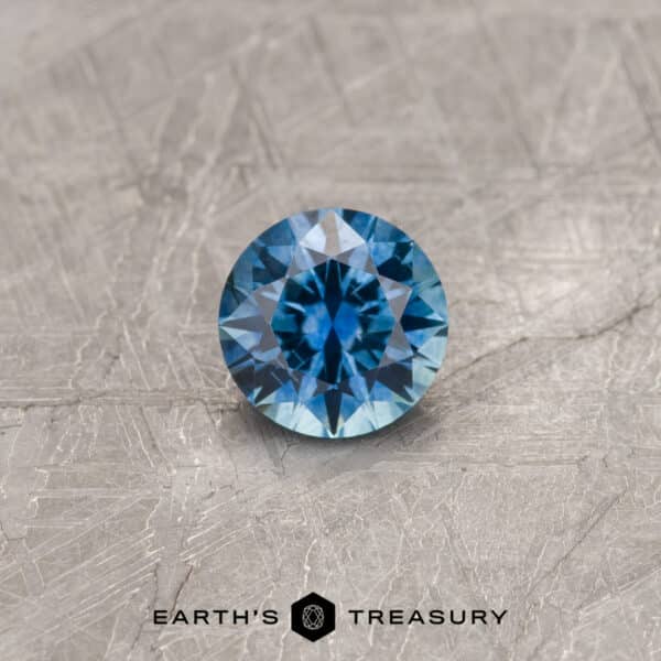 MS1818 A blue Montana sapphire in a classic diamond round brilliant design