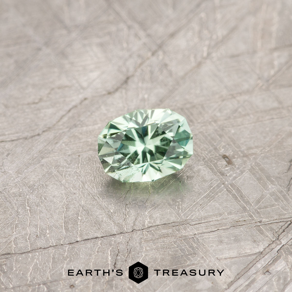 A green Kornerupine in our "Testudo" oval design