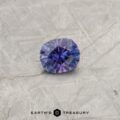 A color-change Montana sapphire in our "Hyperbola" oval design