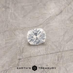 A white Montana sapphire in our "Helena" oval design
