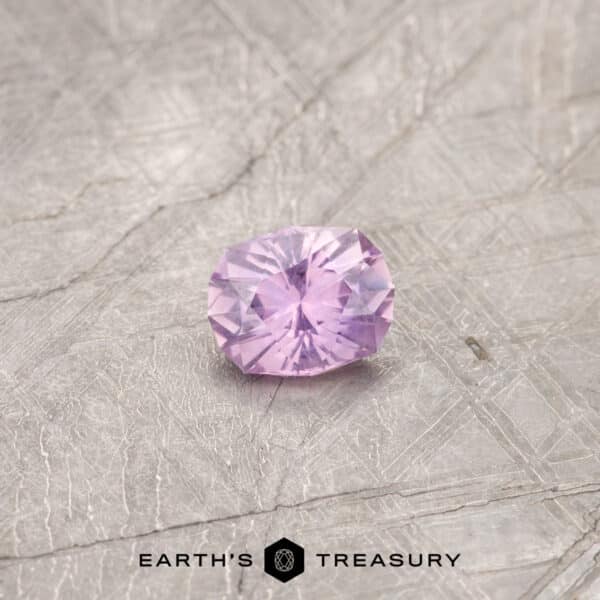A pink Montana sapphire in a custom oval design