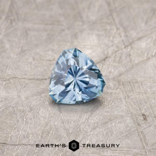 A blue Montana sapphire in our "Triptych" trillion design