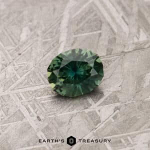 A green Australian Sapphire in our "Serendipity" oval design
