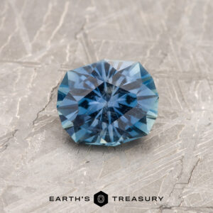A blue Montana sapphire in our "Hyperbola" oval design
