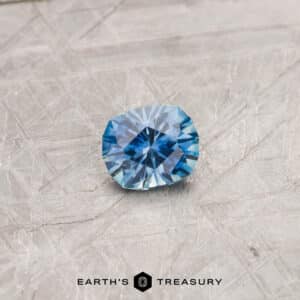 A blue Montana sapphire in our "Hyperbola" oval design