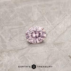 A pink Montana sapphire in our "Serendipity" oval design