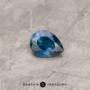 A particolored Montana sapphire in our "Apios" pear-shaped design