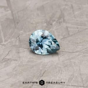 A blue-green Montana sapphire in our "Apios" pear-shaped design