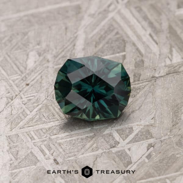 A blue-green Australian Sapphire in our "Helena" oval design