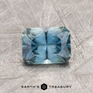 A blue-green Montana sapphire in our "Fourth of July" rectangle design