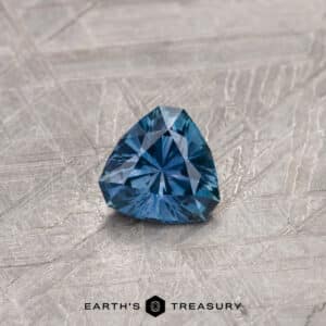 A blue Montana sapphire in our "Triptych" trillion design