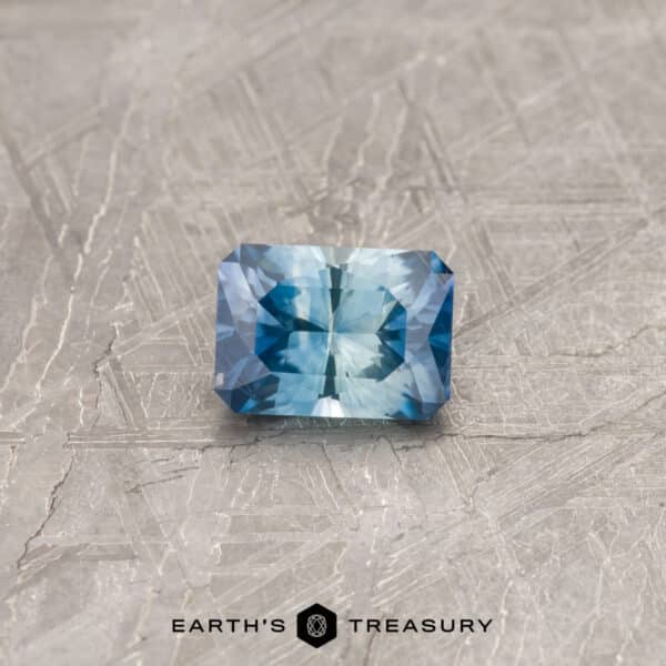 1.07-Carat Montana Sapphire (Heated) A particolored Montana sapphire in our "Fourth of July" rectangle design