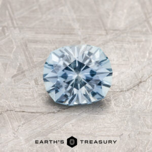 A blue Montana sapphire in our "Hyperbola" oval design