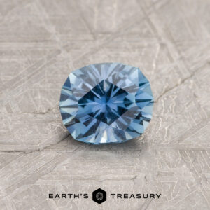A blue Montana sapphire in our "Hyperbola" oval design