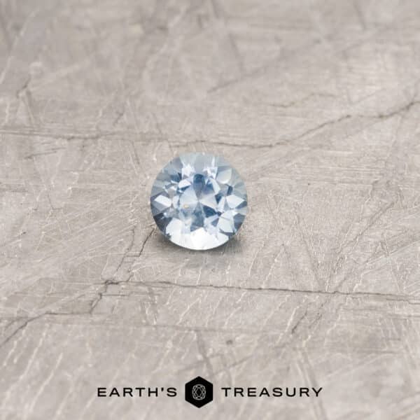 0.59-Carat Pale Aqua Umba Sapphire A blue Umba sapphire in a classic diamond round brilliant design