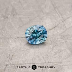 A particolored Montana sapphire in our "Hyperbola" oval design