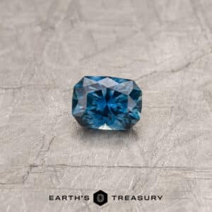 A blue-green Montana sapphire in our "Eureka" rectangle design