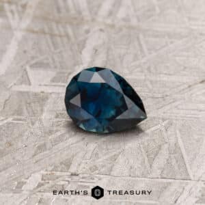 A blue-green Montana sapphire in our "Apios" pear-shaped design