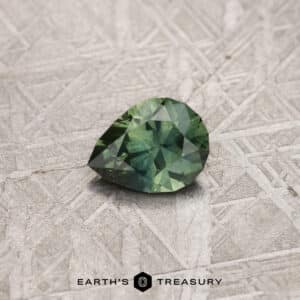 A green Montana sapphire in our "Apios" pear-shaped design