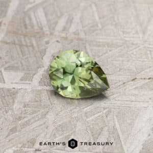 A green Montana sapphire in our "Apios" pear-shaped design