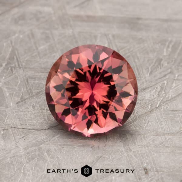 A pink California Tourmaline in a classic diamond round brilliant design
