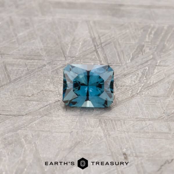 0.86-Carat Australian Sapphire (Heated) A blue-green Australian Sapphire in our "Fourth of July" rectangle design