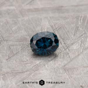 A blue Australian Sapphire in our "Serendipity" oval design