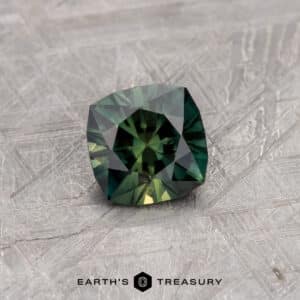 A green Australian Sapphire in our "Stella" square cushion design