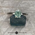The “Fleur” Solitaire in platinum with 1.43-Carat Green Montana Sapphire