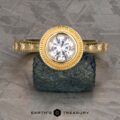 The “Serafina” Halo Ring in 18k yellow gold with 1.21-carat Montana sapphire