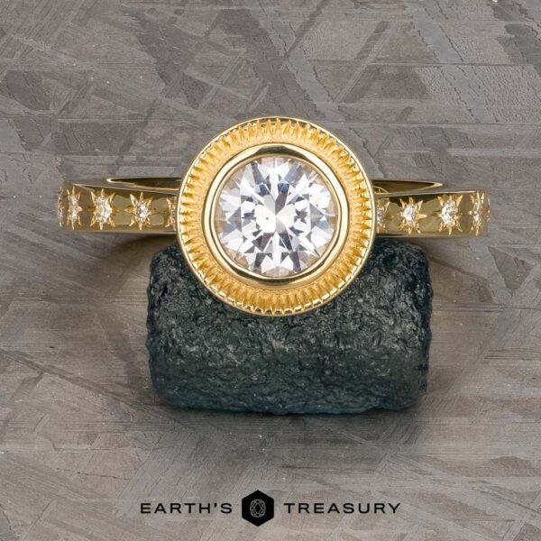 The “Serafina” Halo Ring in 18k yellow gold with 1.21-carat Montana sapphire The “Serafina” Halo Ring in 18k yellow gold with 1.21-carat Montana sapphire