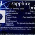 AGL sapphire brief for ET3339TMG, confirming its identification as an unheated natural sapphire weighing 2.60 carats and measuring 10.5 x 7.1 x 4.6mm