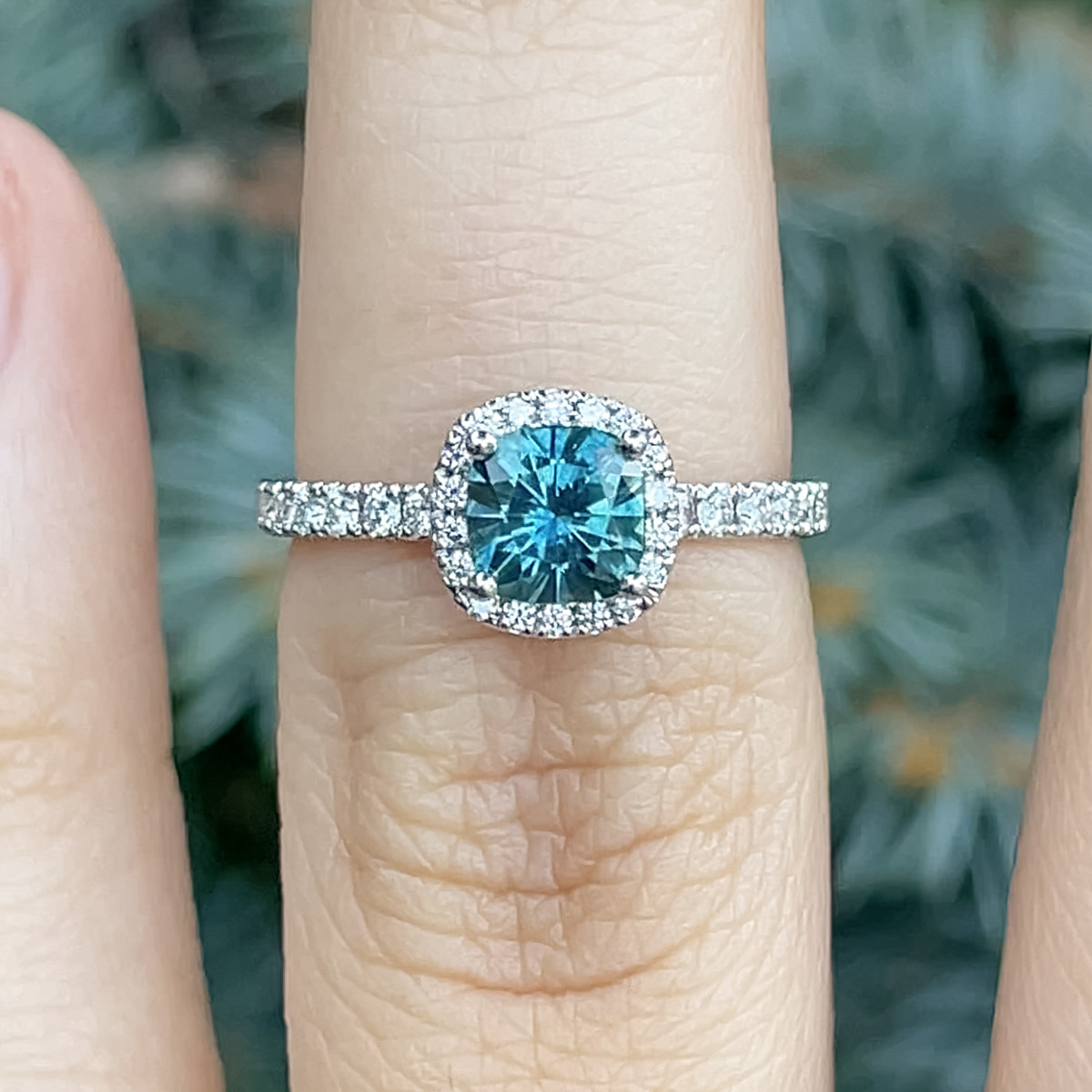 The Petite Pave Halo in 18K white gold with 0.95-Carat Montana Sapphire