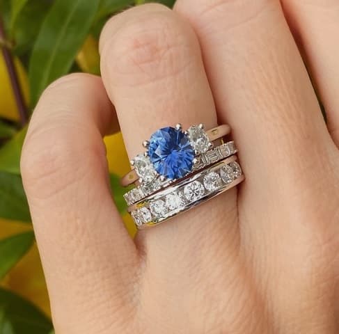 A photo from a customer review featuring a platinum "Evelyn" ring with a 1.82-carat Montana sapphire