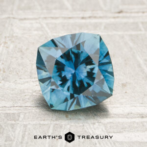 A teal Montana sapphire in our "Stella" square cushion design